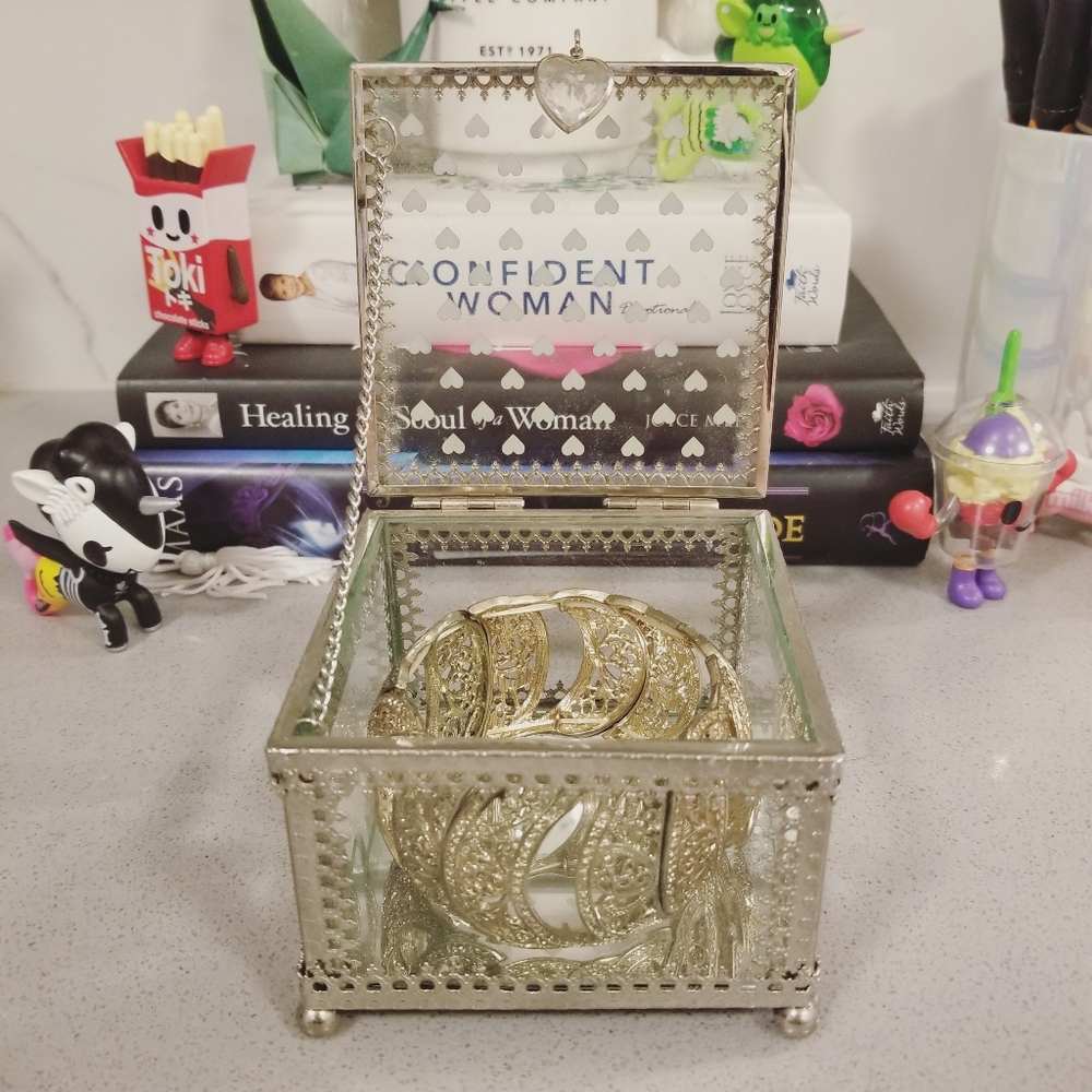 Nicole Miller box, bracelet included.